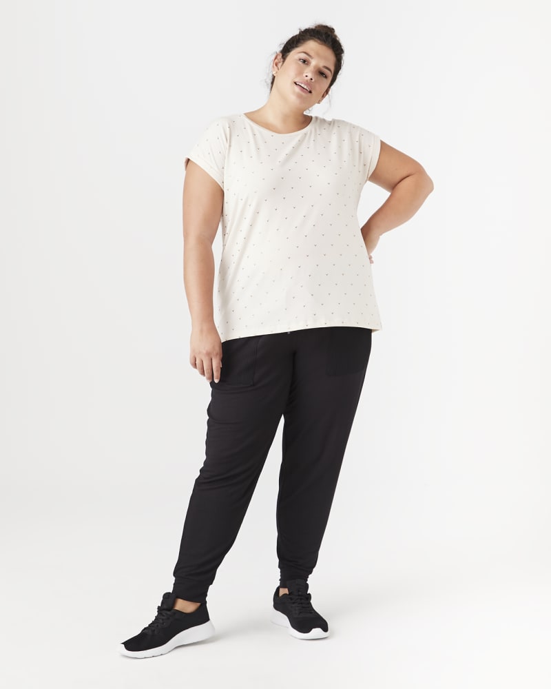 Plus size model with hourglass body shape wearing Vita Dolman Top by Marc NY | Dia&Co | dia_product_style_image_id:140198